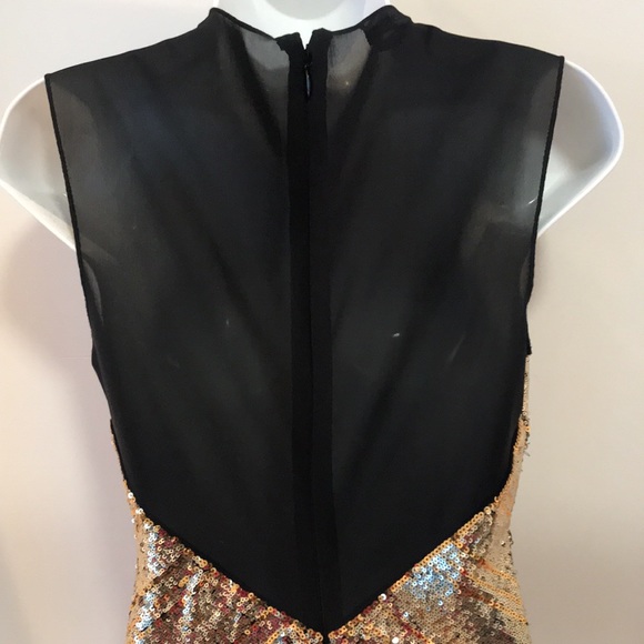 Bebe sequin dress. Low front plunge with a mesh back. - Picture 6 of 10